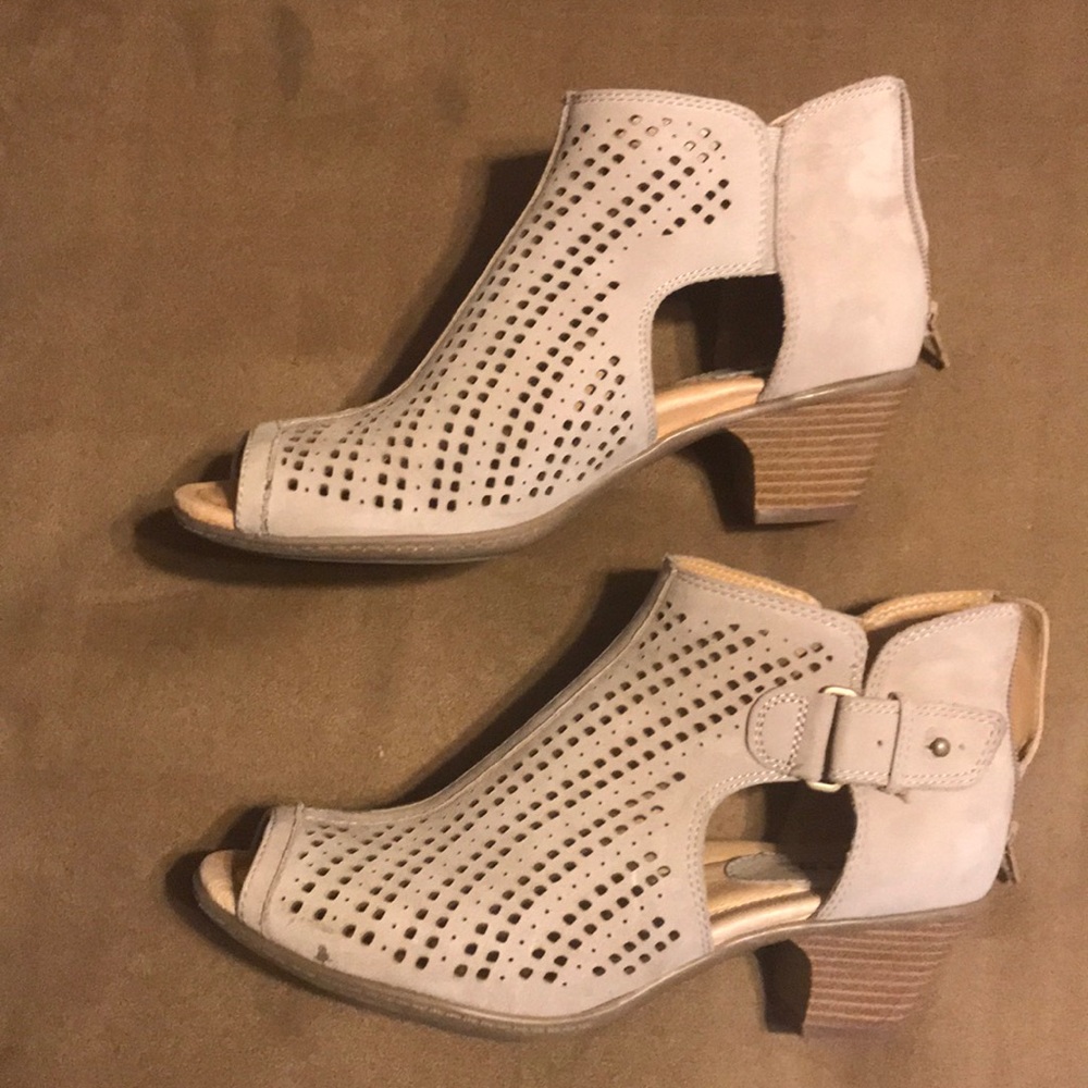 Worn a few times. Very comfortable tan color